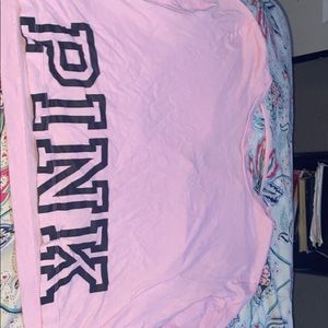two cropped PINK shirts with cut out back